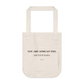 Natural organic cotton canvas tote with “You Are African Too. Ask Your Mama.” printed in black serif type — Iska Press, WE ARE Drop 01