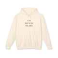 Ivory hoodie with “I Am Because We Are” printed in dark serif type — Iska Press, WE ARE Drop 01