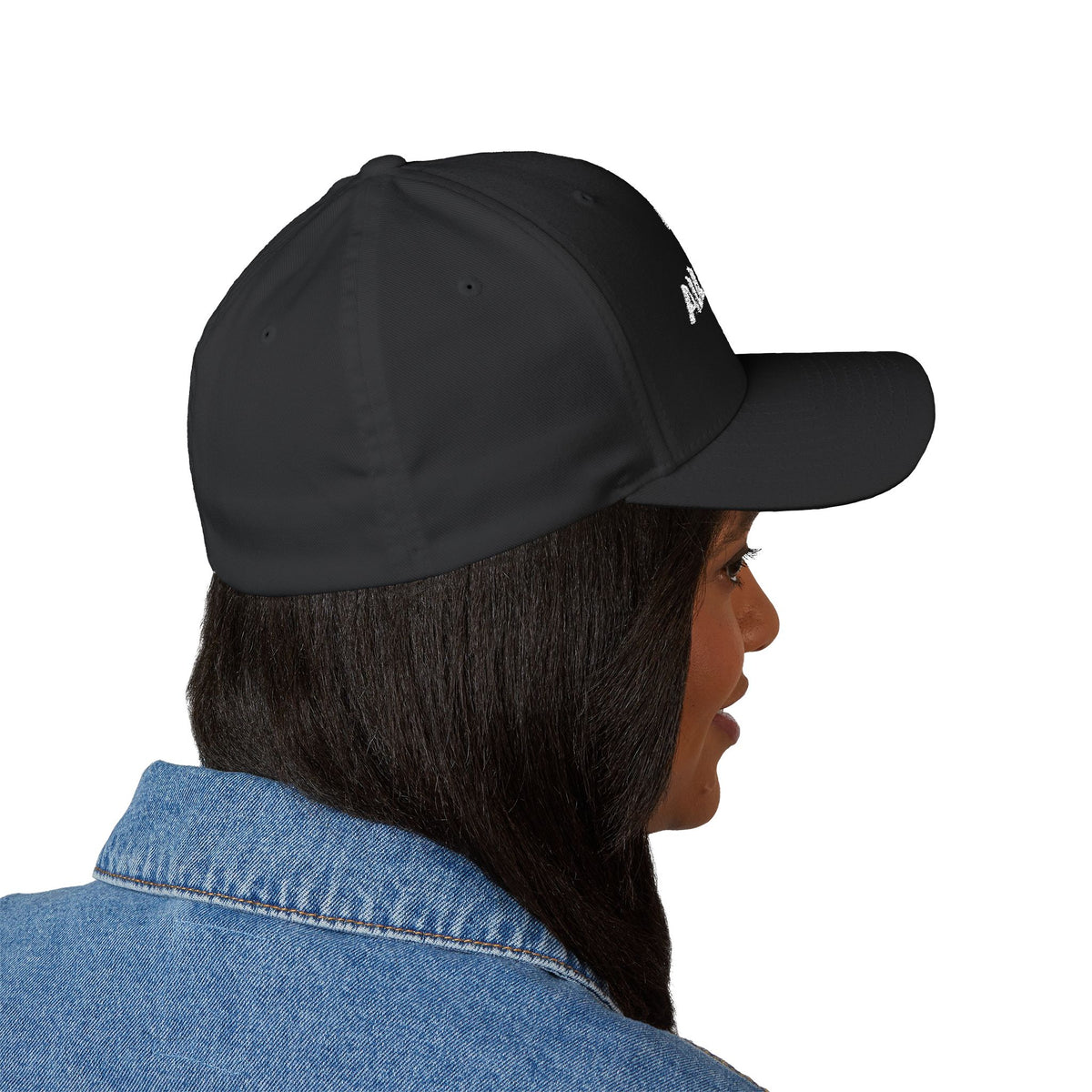 Black embroidered cap, angled view — Iska Press, WE ARE Drop 01